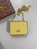 on the new model 447 Brand • Coach wallet