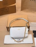 Cowhide version of Coach Teri Mahjong bag, glacier white color scheme + classic C relief