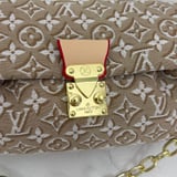 7778 Louis Vuitton has Naimai handbag