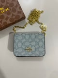 on the new model 447 Brand • Coach wallet