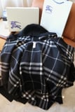 Burberry embroidered hooded checked cloak.
