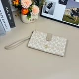 Coach handheld change purse