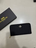 On the new model 360 • Coach wallet