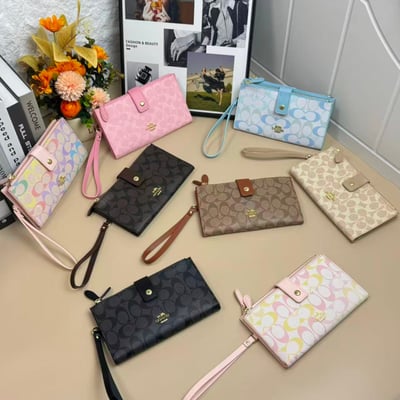 Coach handheld change purse