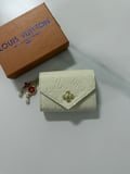 Louis Vuitton handheld change purse 384 #