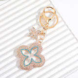Cross-border tassel four-leaf clover alloy keychain INS delicate accessories key chain send girlfriend bag buckle pendant wholesale