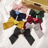 Korean style elegant bow hair clip simple fashion girl P home triangle mark spring clip top clip ins net red vintage