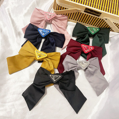 Korean style elegant bow hair clip simple fashion girl P home triangle mark spring clip top clip ins net red vintage