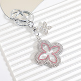 Cross-border tassel four-leaf clover alloy keychain INS delicate accessories key chain send girlfriend bag buckle pendant wholesale