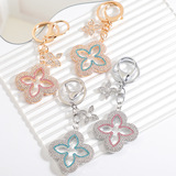 Cross-border tassel four-leaf clover alloy keychain INS delicate accessories key chain send girlfriend bag buckle pendant wholesale