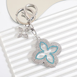 Cross-border tassel four-leaf clover alloy keychain INS delicate accessories key chain send girlfriend bag buckle pendant wholesale