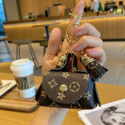 Cute mini card leather small bag change earphone bag storage bag old flower pendant key card key bag