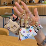 Cute mini card leather small bag change earphone bag storage bag old flower pendant key card key bag