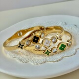 New Titanium Steel Four Leaf Clover Read Zircon Bracelet Stretch Shell Black Green Opening Bracelet Premium Design