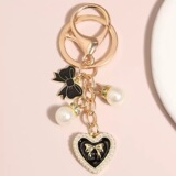 Cross-border sales love leather pearl chain winter all-match love pearl chain keychain pendant