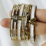 Titanium steel V-letter bracelet wholesale imitation shell design big brand letter foreign trade hot item simple personality niche