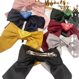 Korean style elegant bow hair clip simple fashion girl P home triangle mark spring clip top clip ins net red vintage