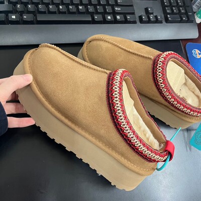 Thick bottom ethnic wind and snow boots wool semi slippers 2026 new winter fur all in one women's shoes Henan Sampo Village UGG